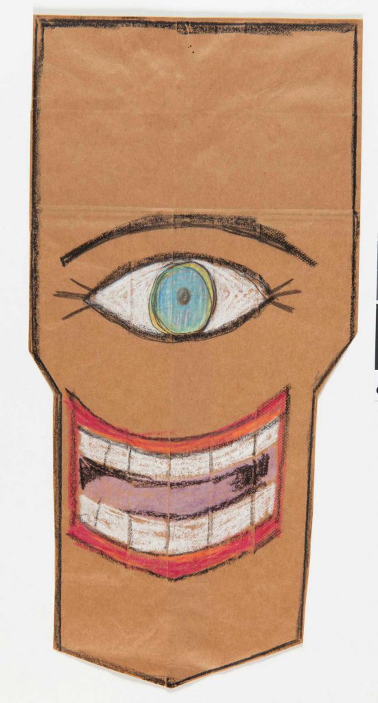 <em>Mask</em>, 1961-62. Ink and crayon on brown paper bag, 15 7/8 x 7 7/8 in. The Art Institute of Chicago; Gift of The Saul Steinberg Foundation