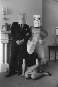 Small Family Group, Chelsea Hotel (from the Mask Series with Saul Steinberg), 1962. Photograph by Inge Morath, © The Inge Morath Foundation