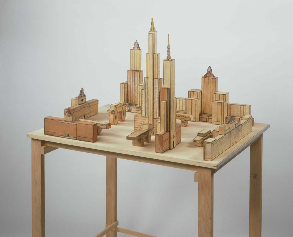 <em>Downtown</em>, 1987. Mixed media on wood, 31 x 62 ¼ x 42 in. The JPMorgan Chase Collection, New York.