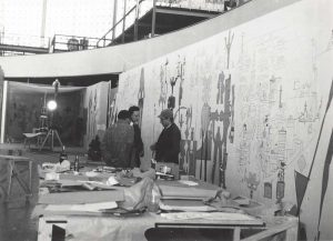 Steinberg at work on The Americans, US Pavilion, Brussels World’s Fair, March-April, 1958.
