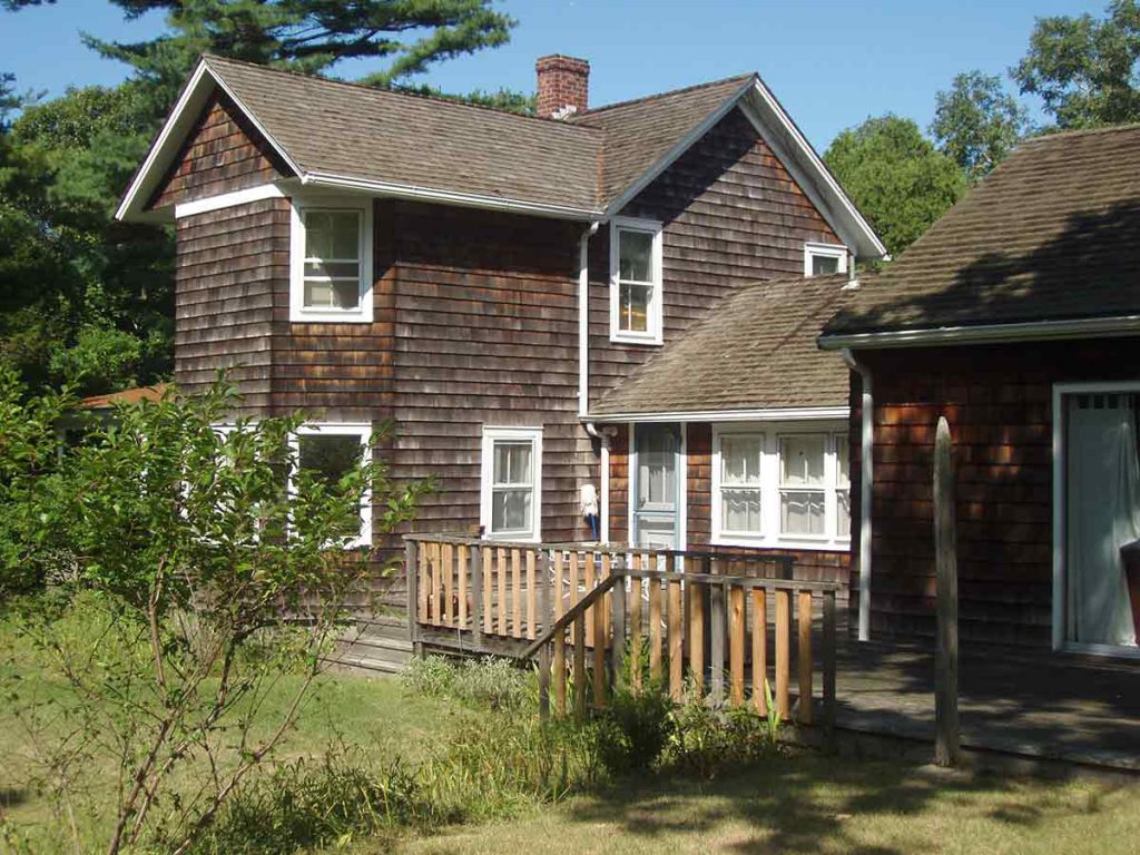 Steinberg’s house in Amagansett. The taller structure at left is the original house purchased in 1959.