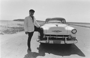 Steinberg with his 1953 Chevrolet, Amagansett, 1974. Photo by Evelyn Hofer. © Estate of Evelyn Hofer. Saul Steinberg Papers, Beinecke Rare Book and Manuscript Library, Yale University