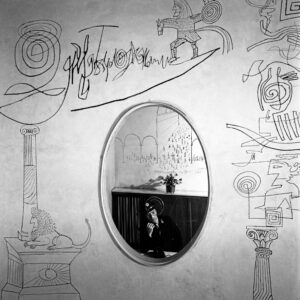 Saul Steinberg's graffiti art on the wall.