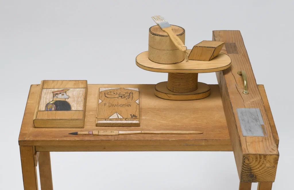 Gulliver Table (detail), 1986. Carved wood, oil, colored pencil, crayon, copper, tin, mental handle and string, 36 ½ x 27 ¾ x 26. The Saul Steinberg Foundation, New York.